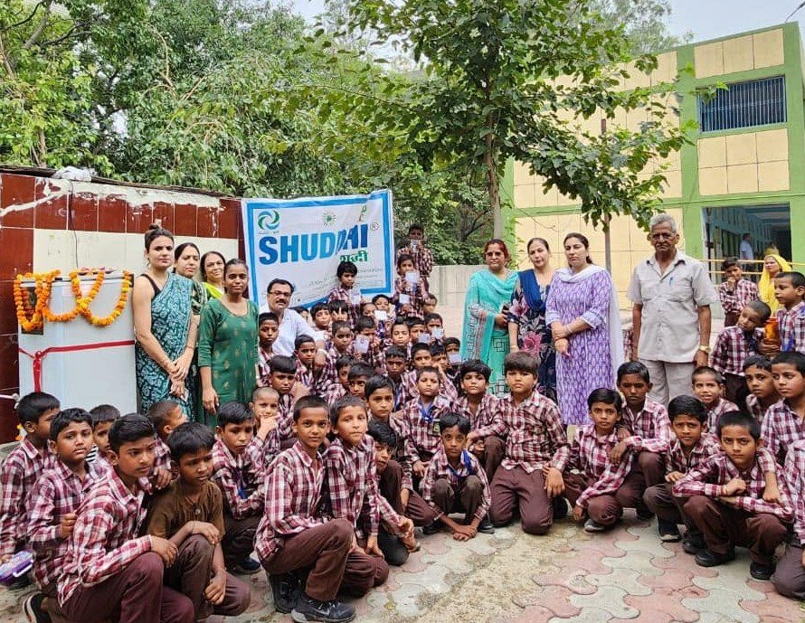 Students at a new school water station