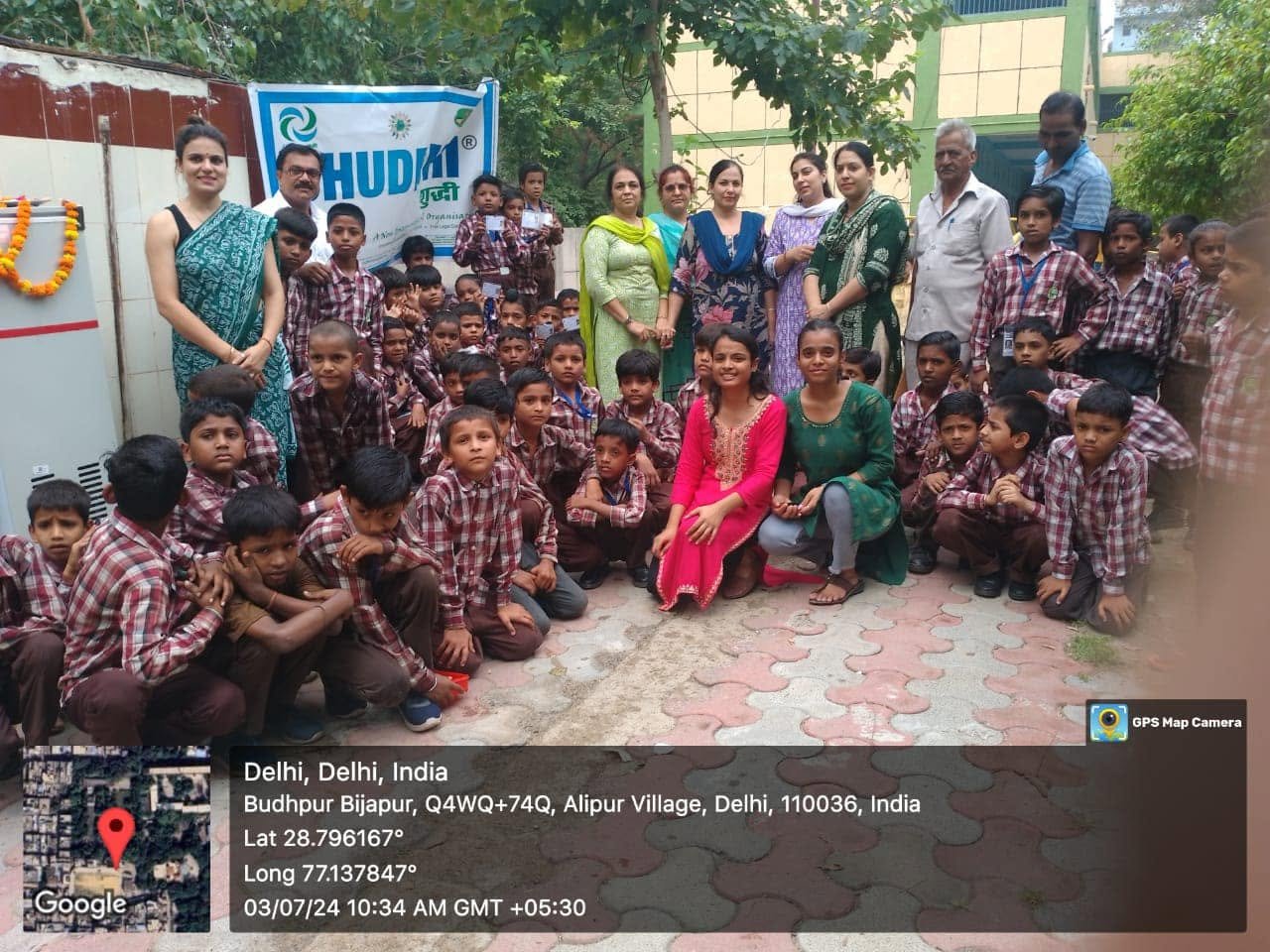 Handing over a water system to a school
