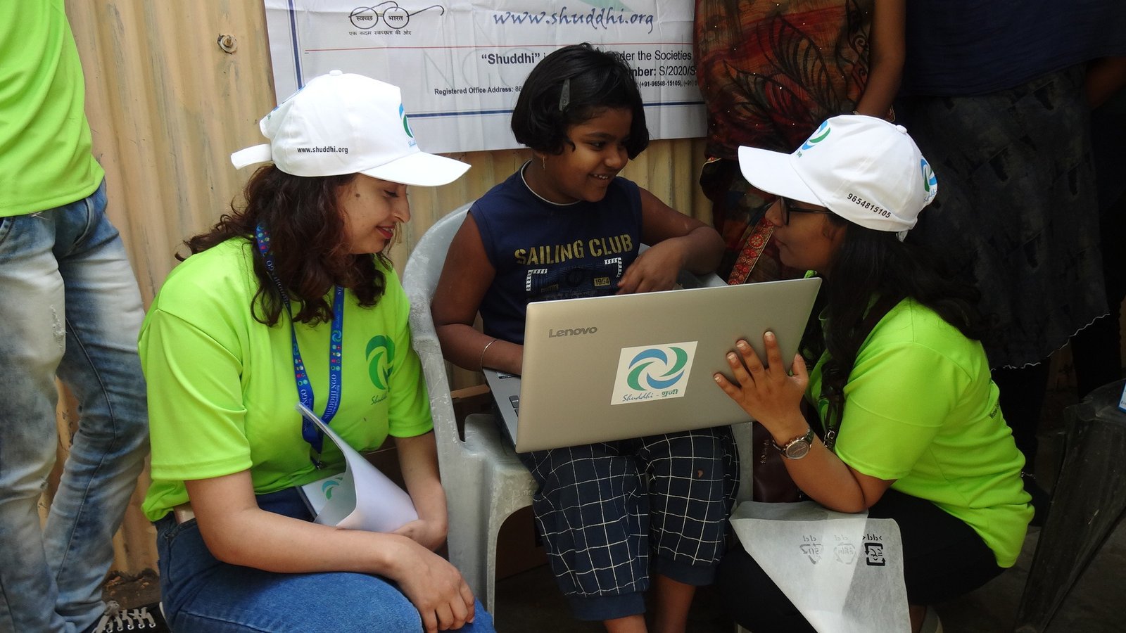 Volunteers teaching children